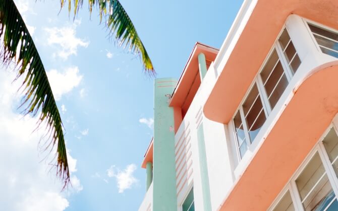 white beach hotel with peach roof